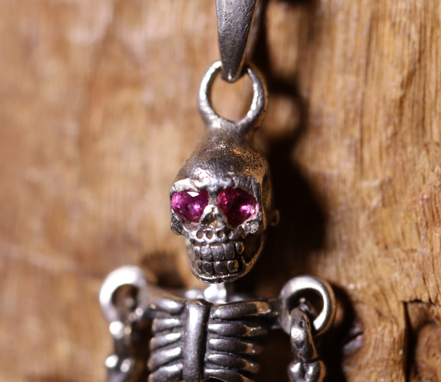 Sterling Silver Skeleton Necklace with Ruby Eyes