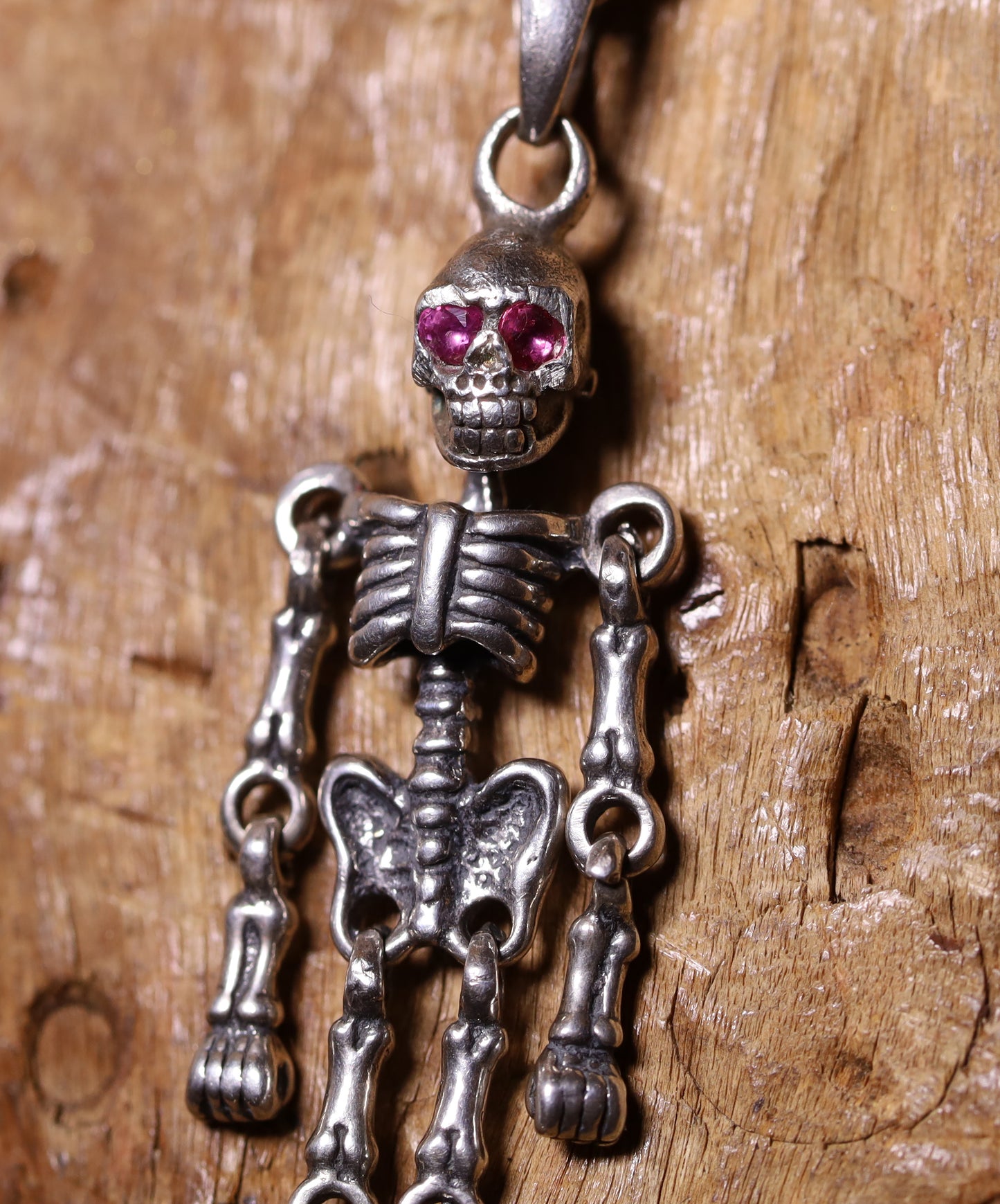 Sterling Silver Skeleton Necklace with Ruby Eyes