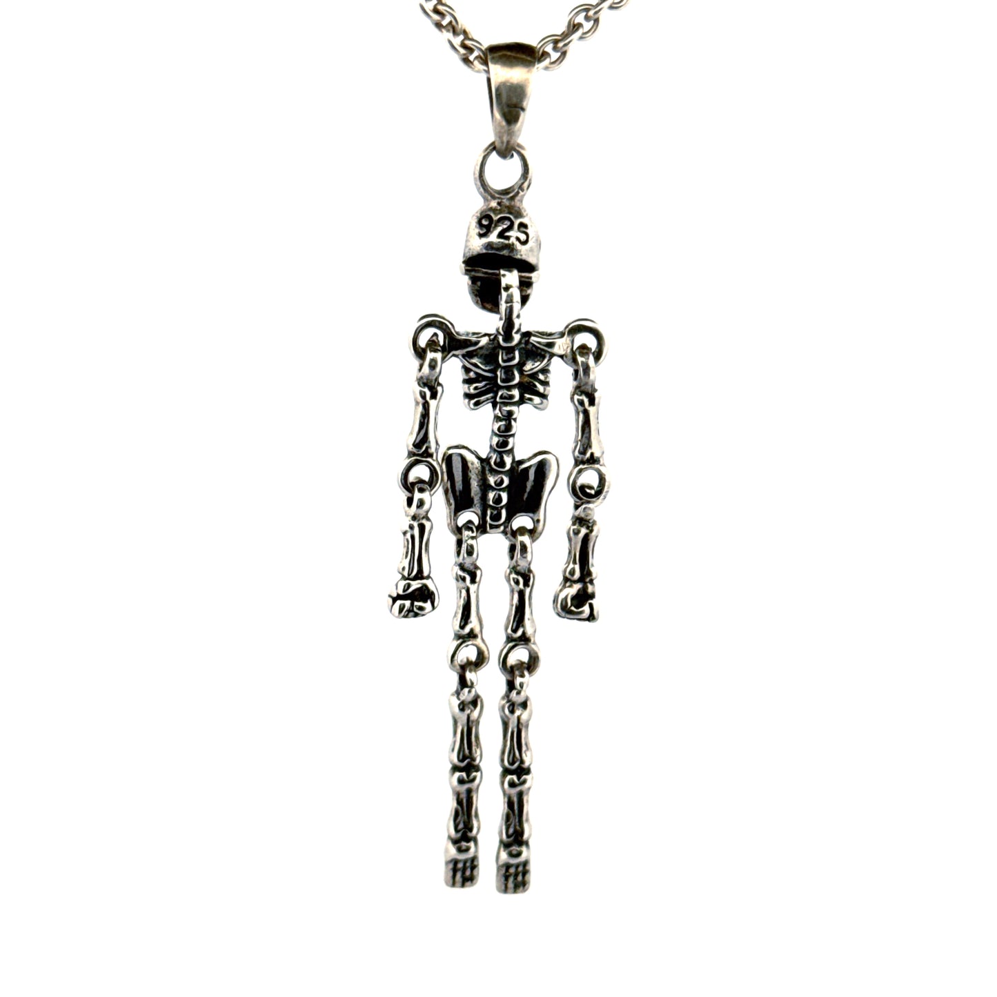 Back view of sterling silver skeleton pendant with ruby eyes