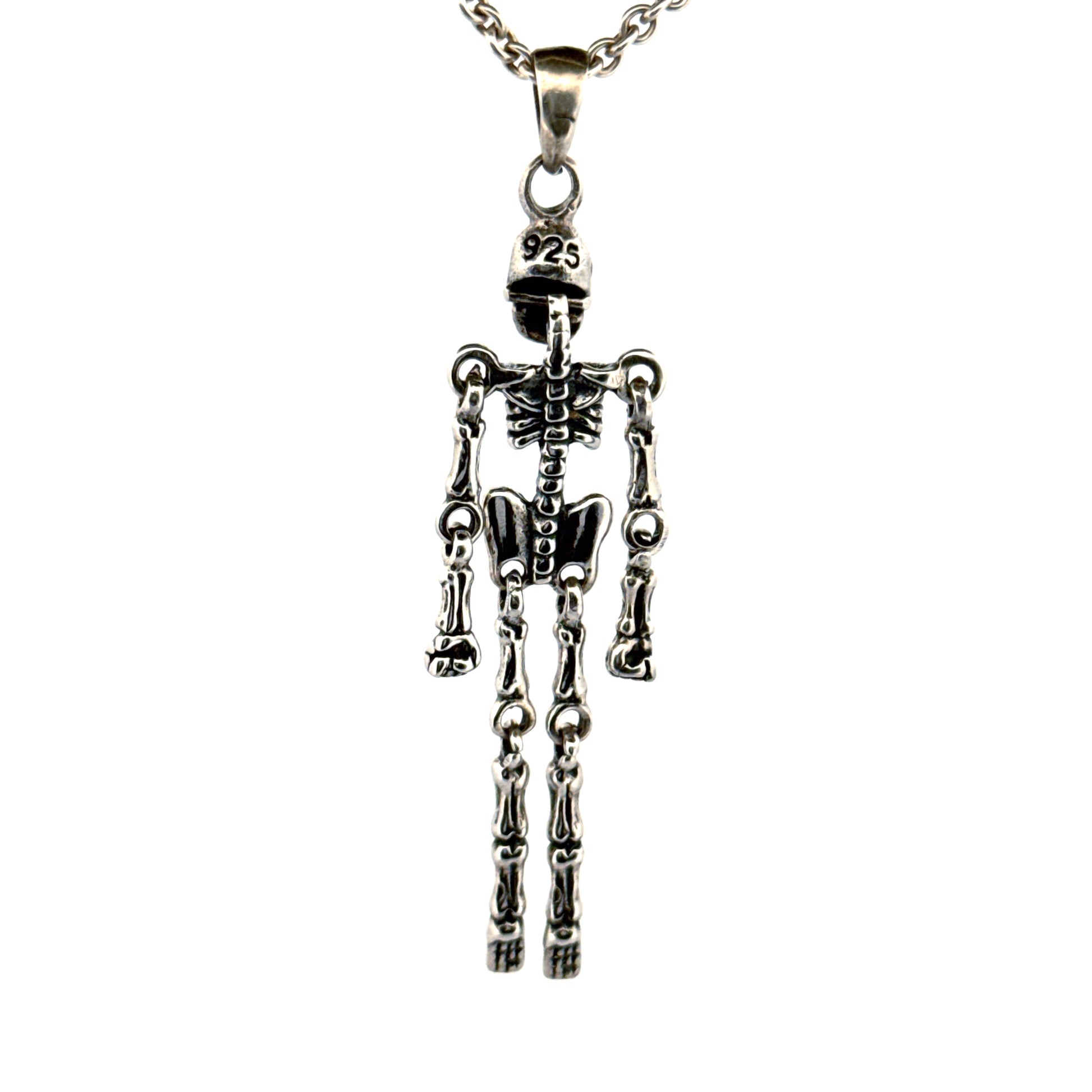 Back view of sterling silver skeleton pendant with ruby eyes